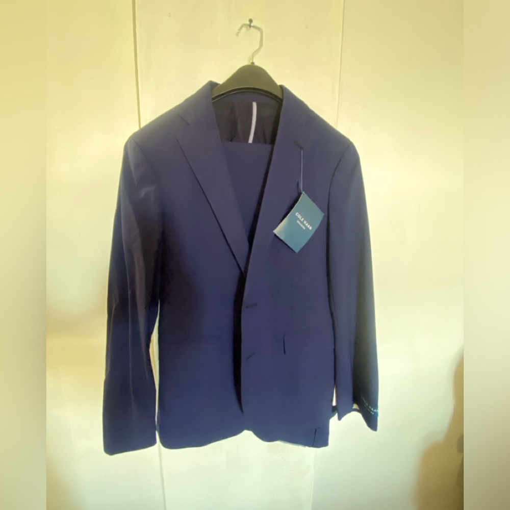 Men’s Slim suit brand new with tags 38S/31W